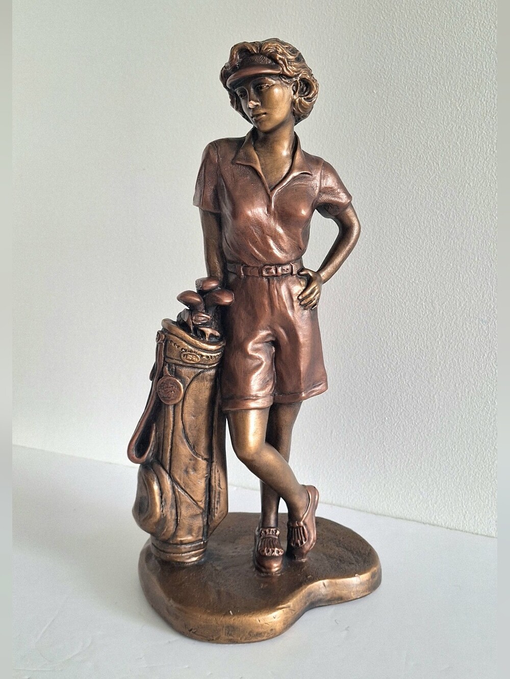 Sculpture of a female golfer